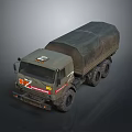 Military Green Truck With Canvas Covered Cargo Bed And Multiple Wheels