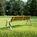 Wooden Outdoor Bench With Metal Frame In Green Grass And Trees Setting