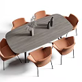 Modern Gray Oval Dining Table Set With Six Orange Chairs And Decorative Vase