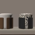 Two Modern Stools With White Brown Wooden Tops And Zebra Pattern Black Bases