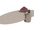Beige Oval Single Sofa With Small Side Table Red Towel Black Decor And Green Item