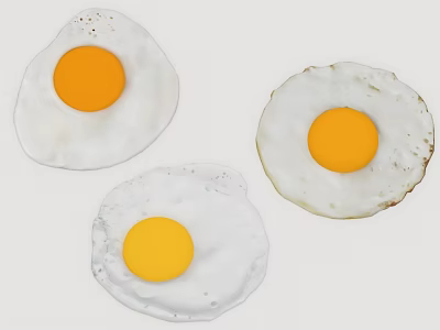 Three Fried Eggs With Golden Yolks And Crispy White Surfaces 3d model