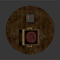 Open Golden Box With Red Cushion And Sun Shaped Ornament Decor Set On Round Tabletop