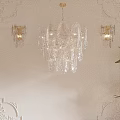 Elegant Crystal Lighting Combination With Chandelier And Wall Sconces On White Carved Wall