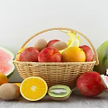 Fresh Assorted Fruits in Wicker Basket with Watermelon Oranges Peaches and Kiwis