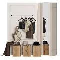 Clothes Rack With Hanging Blouses Dresses And Outfits In Store Display With Mannequin