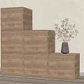 Stacked Wooden Storage Cabinet Shelves With Multiple Drawers And Decorative Vase On Top