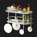Stylish White Multi Tiered Trolley With Fresh Fruits Drinks Books And Decorative Items