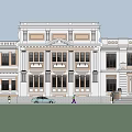 Historic Classical Building Exterior With Ornate Facade Columns Trees And Street Cars