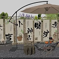 Outdoor Chair with Patio Umbrella Bamboo Screens and Stone Coffee Table in Natural Garden Setting