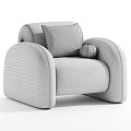 Modern Beige Single Sofa With Black And White Geometric Pillow And Brown Decorative Ball