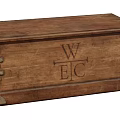 Vintage Wooden Trunk With Carved WEC Letters Rope Accents And Metal Corners