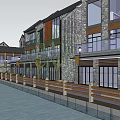 Multi Story Waterfront Commercial Street with Stone Glass Buildings Balconies Wooden Railing and Street Lamps