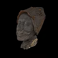 Game Movie Character Sculpture Head Featuring Hooded Stone Texture And Calm Facial Expression