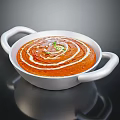 Creamy Red Soup With White Swirls And Green Garnish In White Bowl