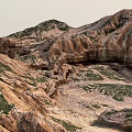 Scenic Mountain Landscape With Rocky Terrain And Green Vegetation Cover