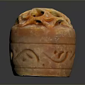 Intricate Orange Stone Sculpture Carving With Hollow Top And Decorative Patterns