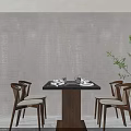 Wooden Dining Table And Chairs Set With Black Tabletop Woven Backrests And Green Plants