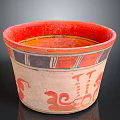 Traditional Ancient Pottery Sculpture With Red Orange Decorations And Intricate Colorful Patterns