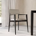 Modern Dining Chair With Light Upholstered Seat And Dark Wooden Frame In Neutral Room