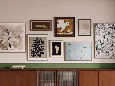 Gallery Wall With Various Framed Artworks Different Styles Wooden Cabinet And Books On Top 3d model