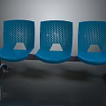 Three Connected Blue Perforated Chairs With Metal Frame And Wheels