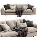 Comfortable Light Gray Multi person Sofa With Soft Pillows And Dark Blanket 3d model