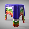 Colorful Stacked Plastic Stools With Blue Green Red Yellow And White Layers
