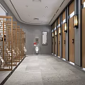 Public Restroom Interior With Gray Walls Baby Changing Station Sinks Mirrors And Sofa Chair