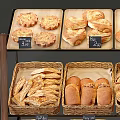 Wooden Bakery Display Shelves With Fresh Bread Pastries And Labeled Trays