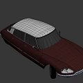 Vintage Burgundy Classic Sedan With White Roof And Sleek Exterior Design
