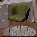 Green Scalloped Back Velvet Accent Chair With Gold Legs On Round Rug Beside White Dresser
