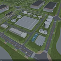Aerial View of Modern Industrial Plant With Landscaped Surroundings Water Facilities and Storage Tanks