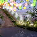 Floral Decor Archway With Colorful Lanterns Illuminated Lights Green Plants And Brick Pathway