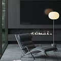 Modern Black Leather Lounge Chair in Stylish Interior with Fireplace Floor Lamp and Large Windows
