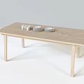 Simple Light Wood Dining Table With Small Bottles Plates And Decorative Patterns 3d model
