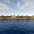 Rural Landscape With Waterfront Blue Sky White Clouds And Village Houses