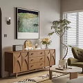 Wooden Chest of Drawers in Living Space with Armchair Potted Plant Artwork and Coffee Table