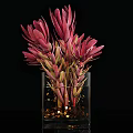 Transparent Glass Vase With Pink And Green Flowers And Gold Sequins At The Bottom