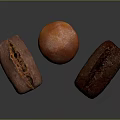 Three Varieties of Freshly Baked Bread with Different Textures and Colors