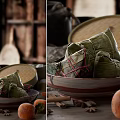 Traditional Chinese Zongzi Wrapped In Fresh Bamboo Leaves Served In Ceramic Bowl With Spices
