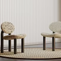 Two Woven Leisure Chairs with Dark Legs on Round Rug and White Blinds Interior