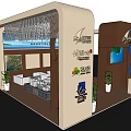 Beige And Brown Exhibition Booth Design With Curved Structure Tables Chairs And Wall Displays
