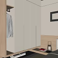 Modern Wardrobe With White Doors And Wooden Frame In Bedroom Setting With Hanging Coat