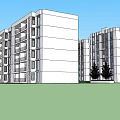 White Multi Story Apartment Building with Windows Balconies and Trees Against Blue Sky