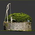 Garden Ornament Featuring Stone Circular Well Green Grass Small Tree Rope And Water Bucket