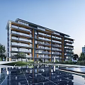 Modern Multi Storey Apartment Building With Balconies And Waterfront Landscaping