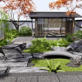 Traditional Karesansui Japanese Garden with Stones Moss Pathway Maple Trees and Wooden Pavilion