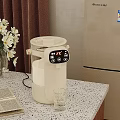White Electric Water Dispenser With Digital Display On Kitchen Counter And Glass Cup