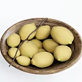 Ceramic Bowl Filled With Fresh Lemons And Herb Sticks